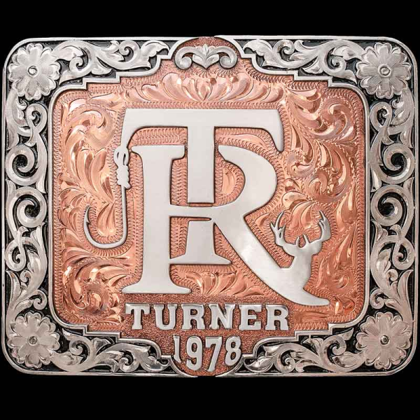 "Another twist on our best-selling Decatur Belt Buckle! Add your Ranch Brand, Custom Logo, Initials and more. Crafted on an engraved Copper base with a natural finish. Detailed with beautiful German Silver scrolls and our signature enamel finish arou